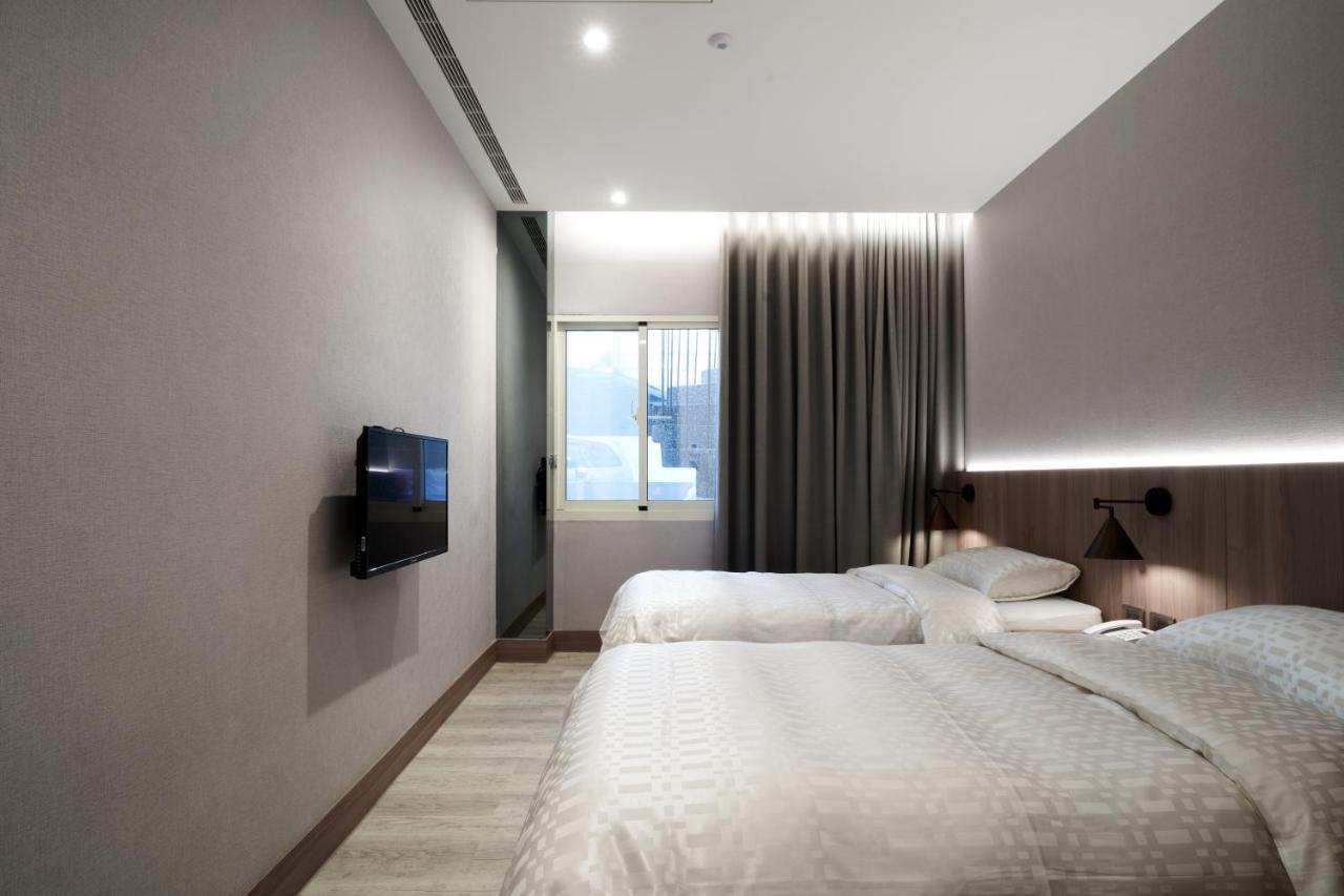 Yung An Business Hotel Dounan Экстерьер фото